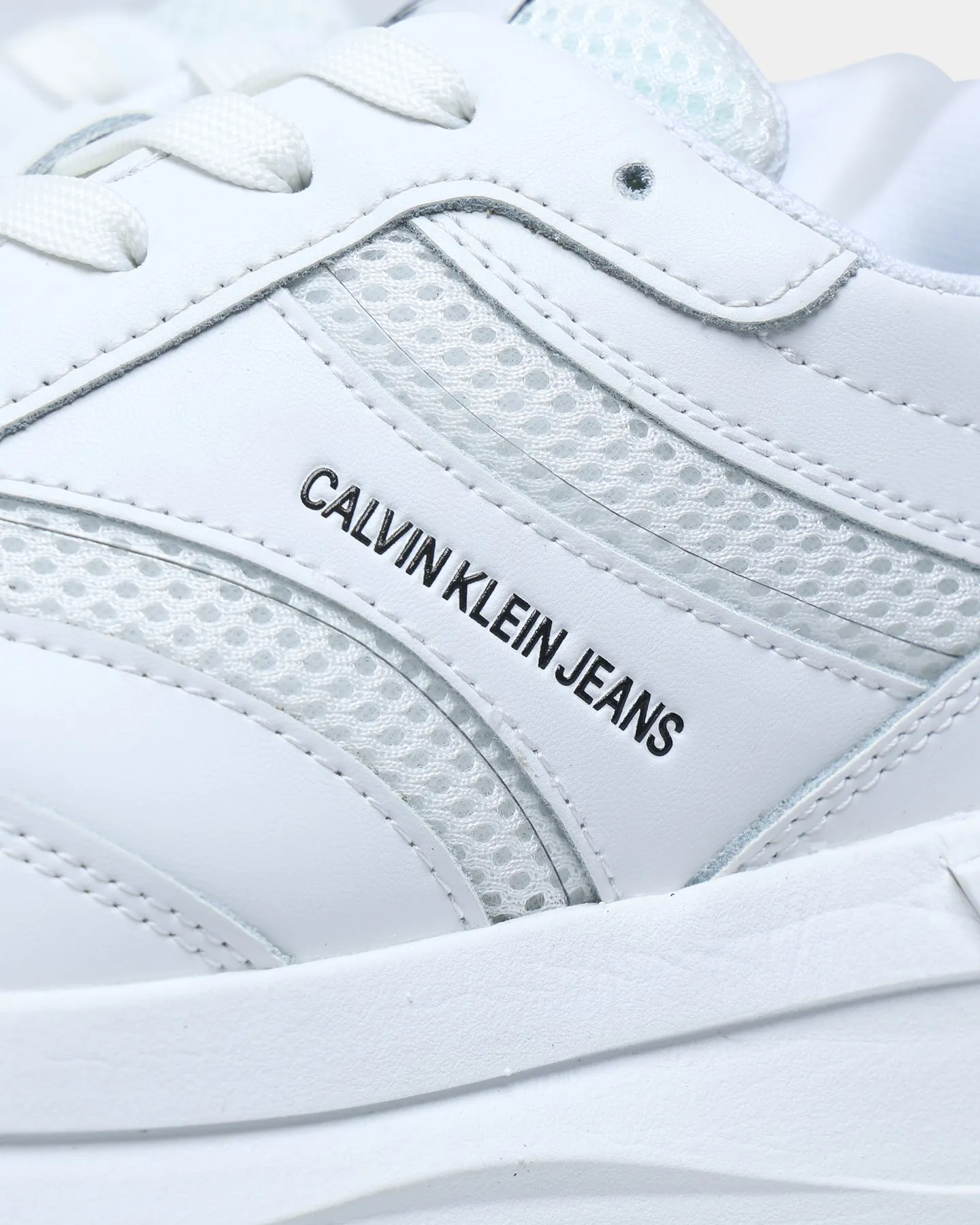 Calvin Klein Women'sRunner Lace Up Sneaker Triple White